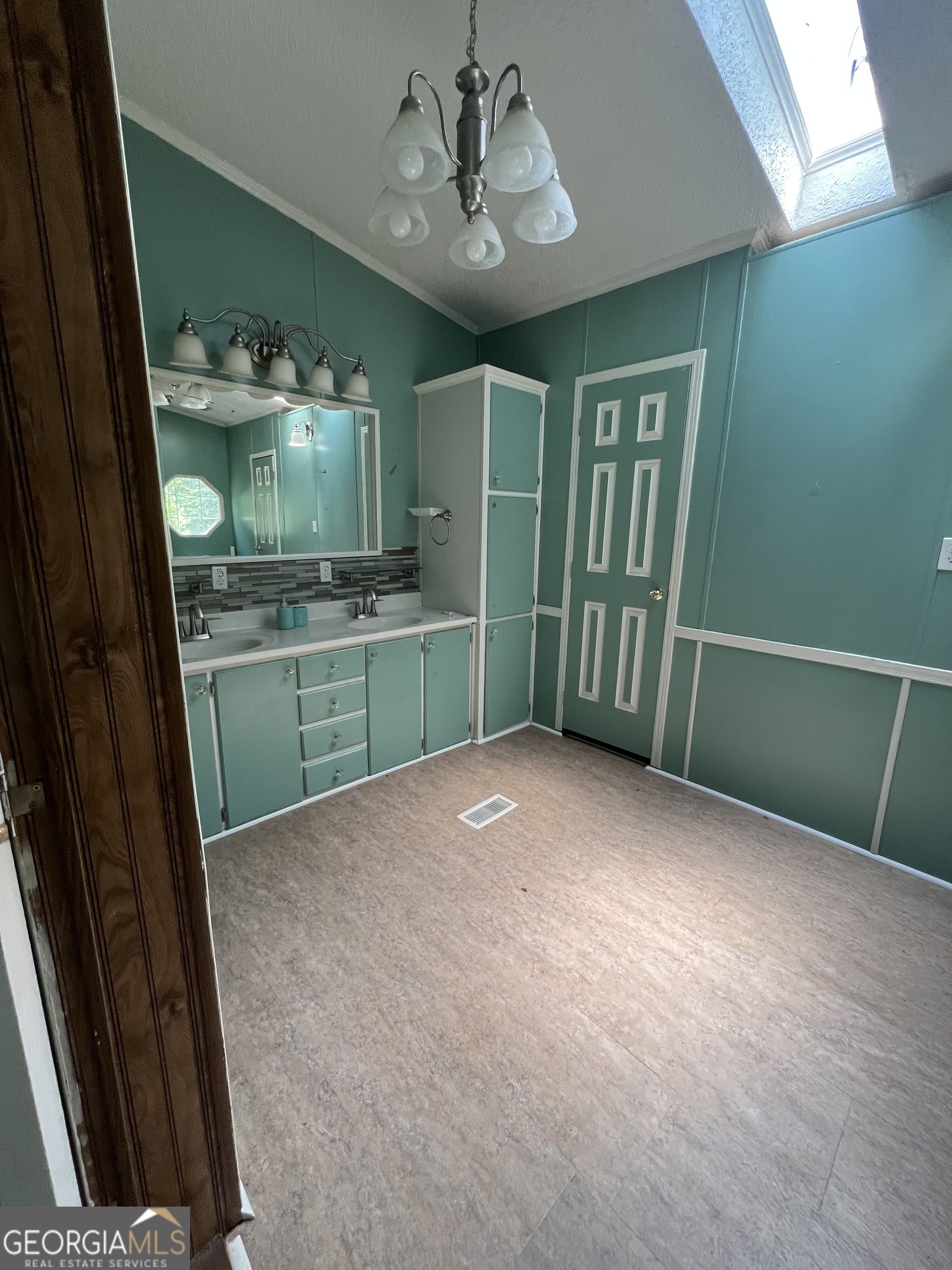 905 Natures Trail Forsyth, GA 31029 - Photo 25 of 59 a spacious bathroom with a sink a mirror and a shower