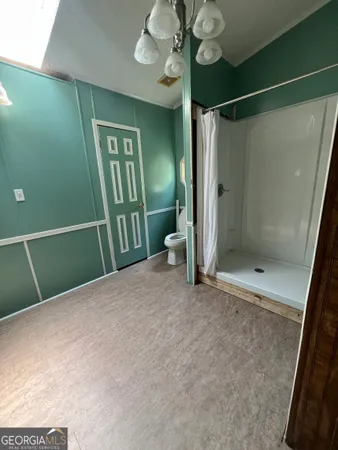 a view of a park with a tree