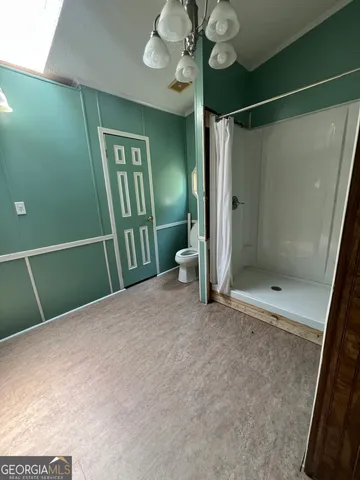 a view of a park with a tree