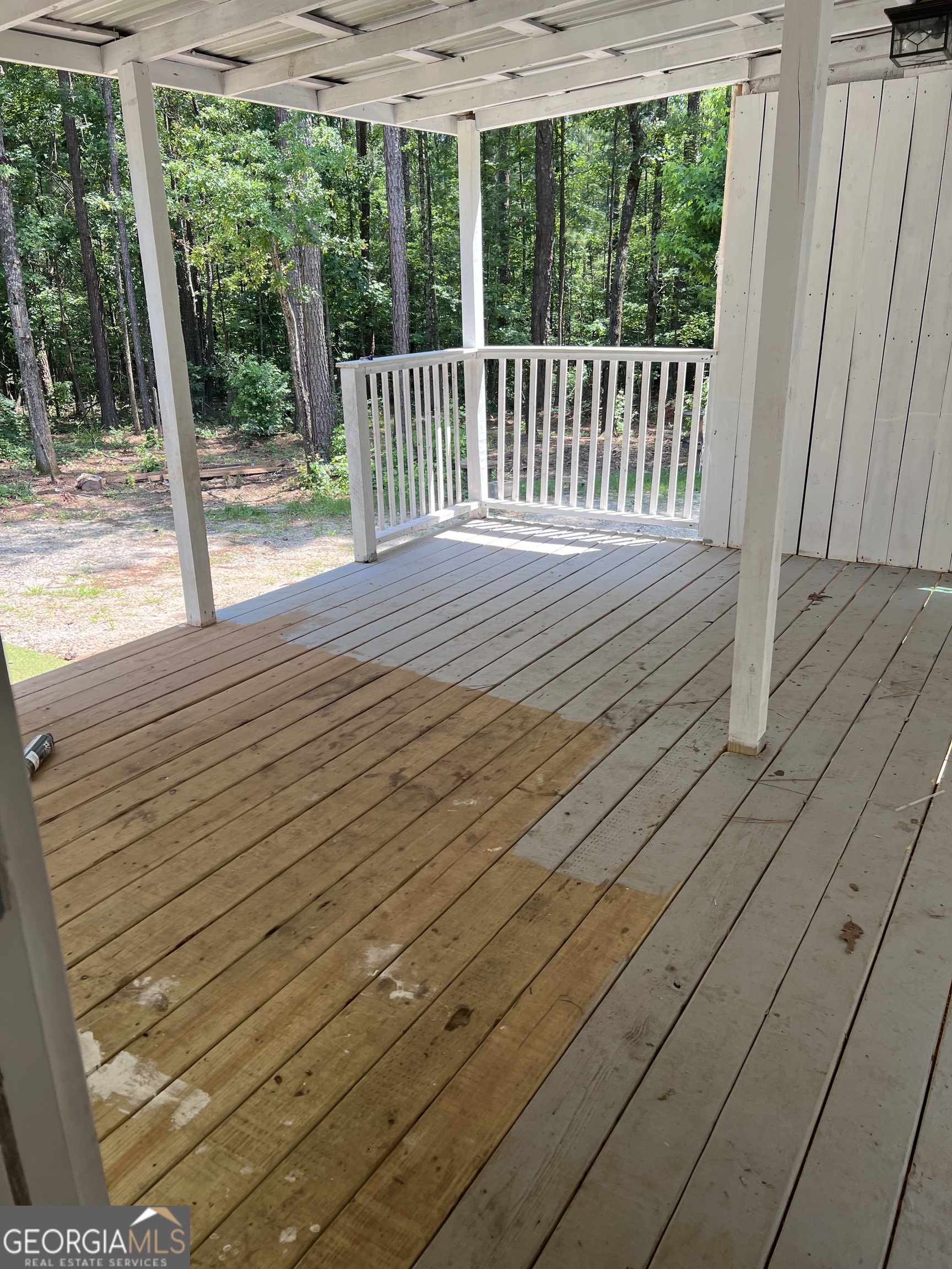 905 Natures Trail Forsyth, GA 31029 - Photo 30 of 59 a view of a wooden deck