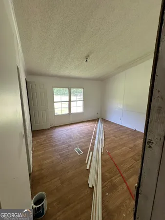 a fire hydrant in the middle of a field