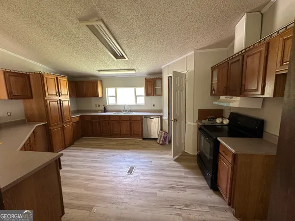 a view of outdoor space with trees all around