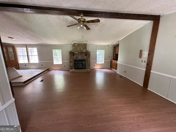 a view of a park with plants and trees