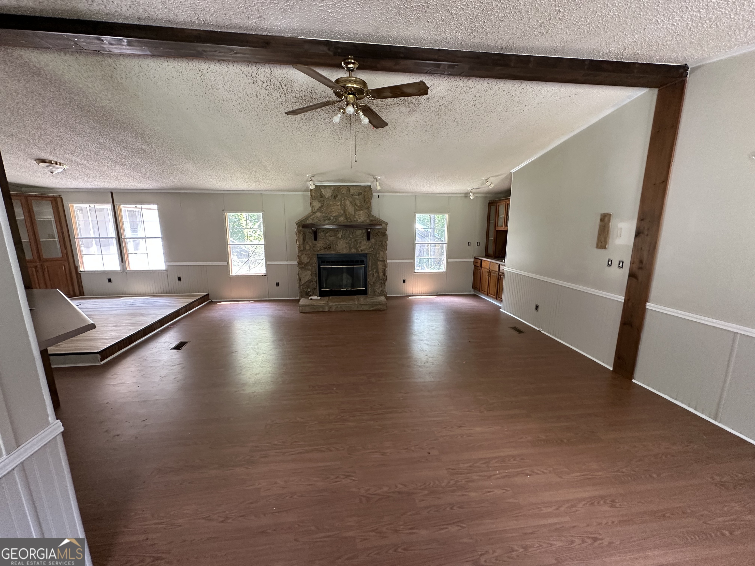 905 Natures Trail Forsyth, GA 31029 - Photo 44 of 59 a view of an empty room with a fireplace