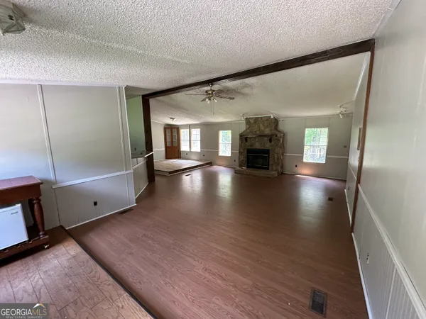 a view of a tiny house with a yard