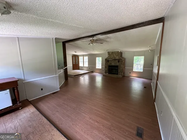 a view of a tiny house with a yard