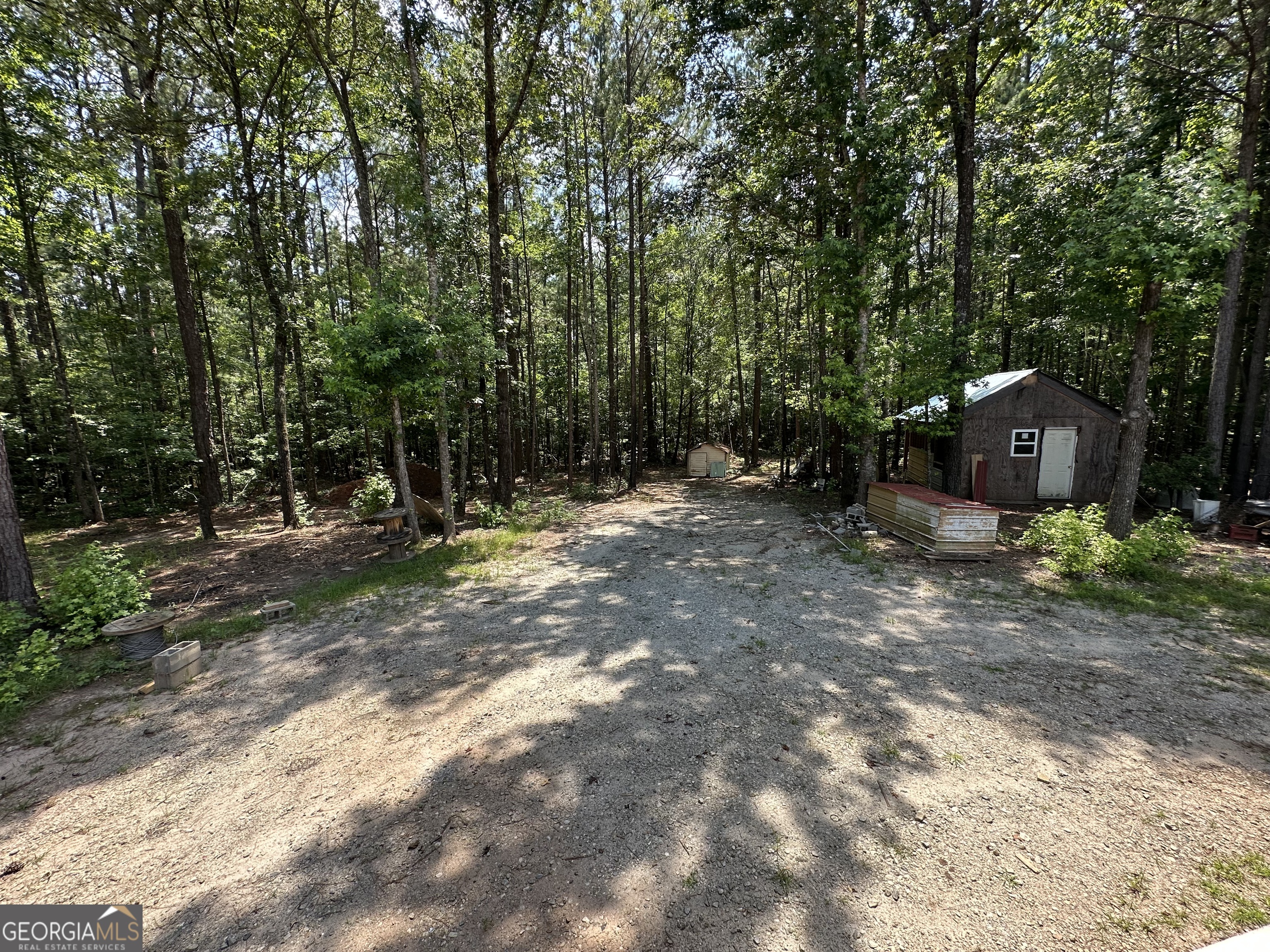 905 Natures Trail Forsyth, GA 31029 - Photo 50 of 59 a backyard of a house with lots of green space