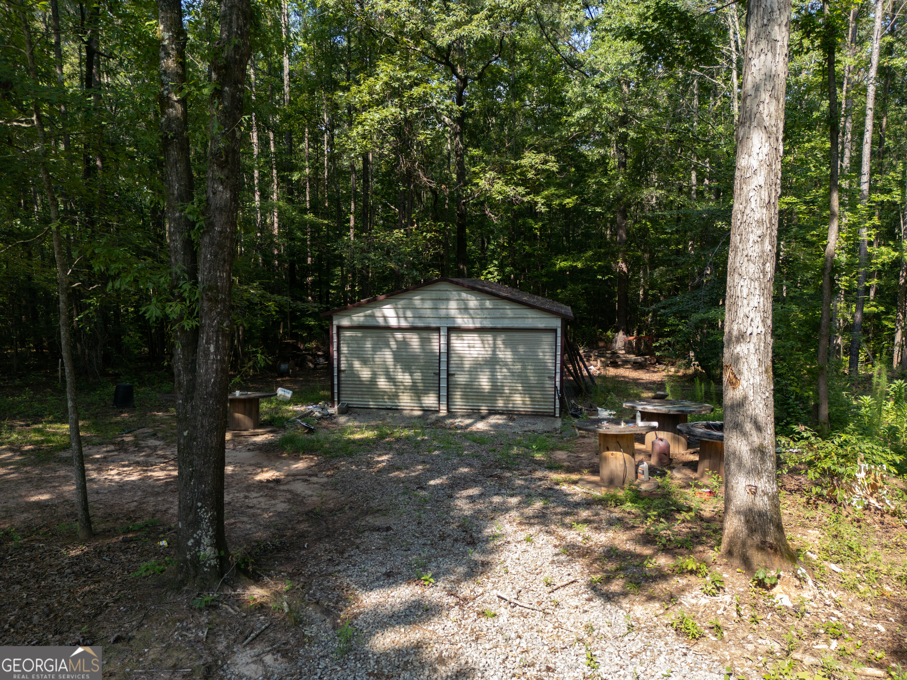 905 Natures Trail Forsyth, GA 31029 - Photo 59 of 59 a view of a tiny house with a yard
