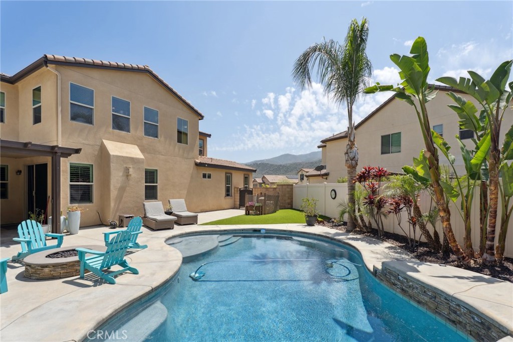 11266 Hutton Road Corona, CA 92883 - Photo 3 of 33 a front view of a house with garden