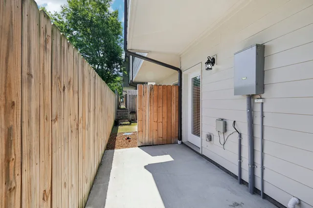 a view of a house with a backyard space