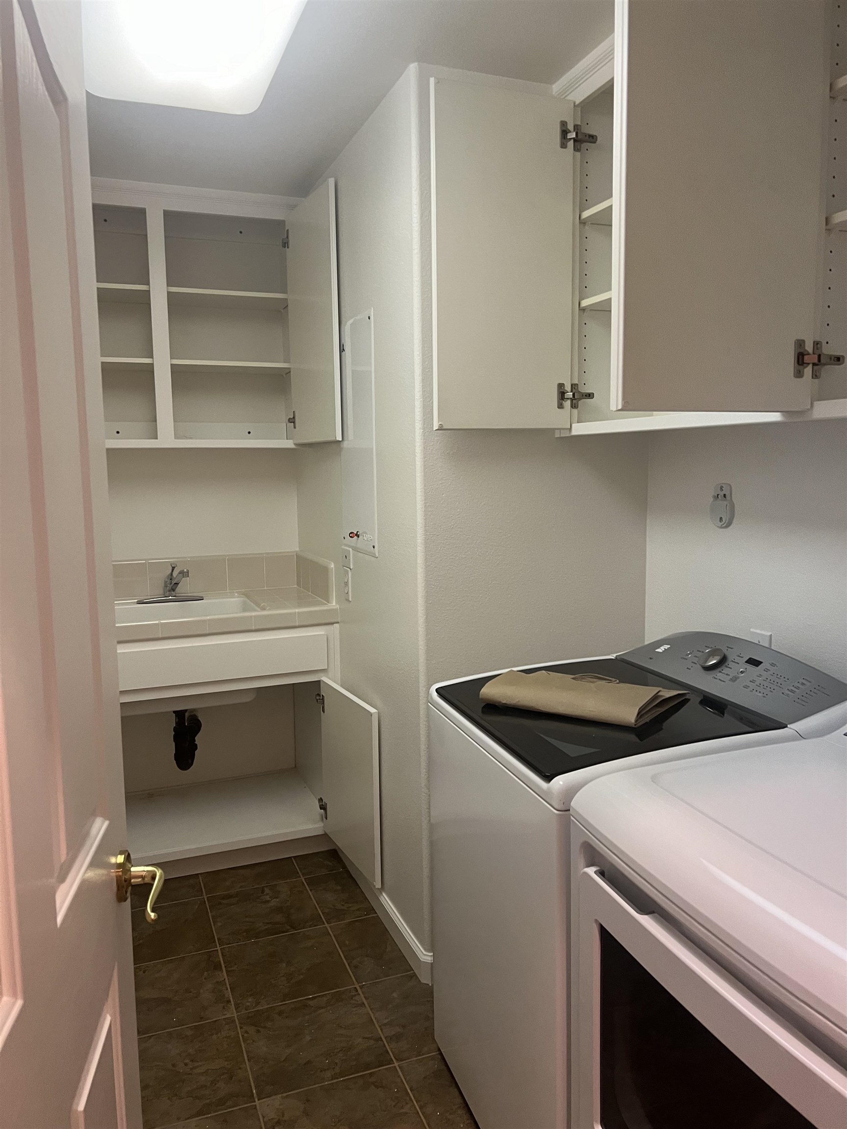 2133 Watercress Place San Ramon, CA 94582 - Photo 13 of 21 a utility room with cabinets