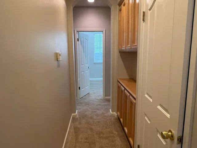 a view of hallway with stairs