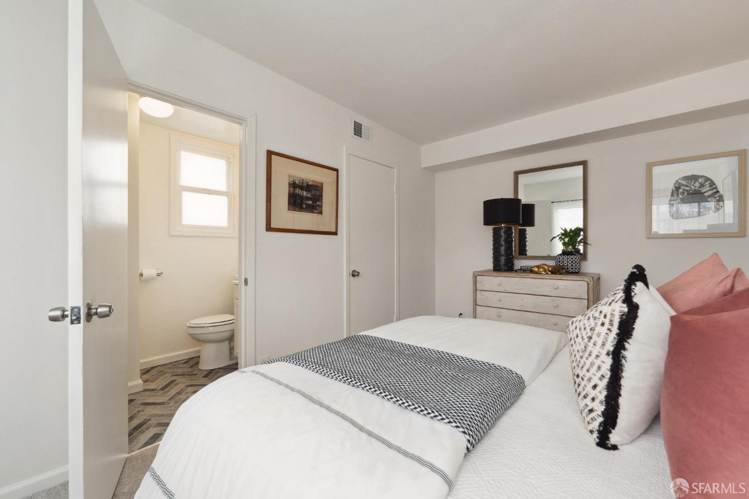 512 Macarthur Drive Daly City, CA 94015 - Photo 39 of 53 a bedroom with a bed and a flat screen tv