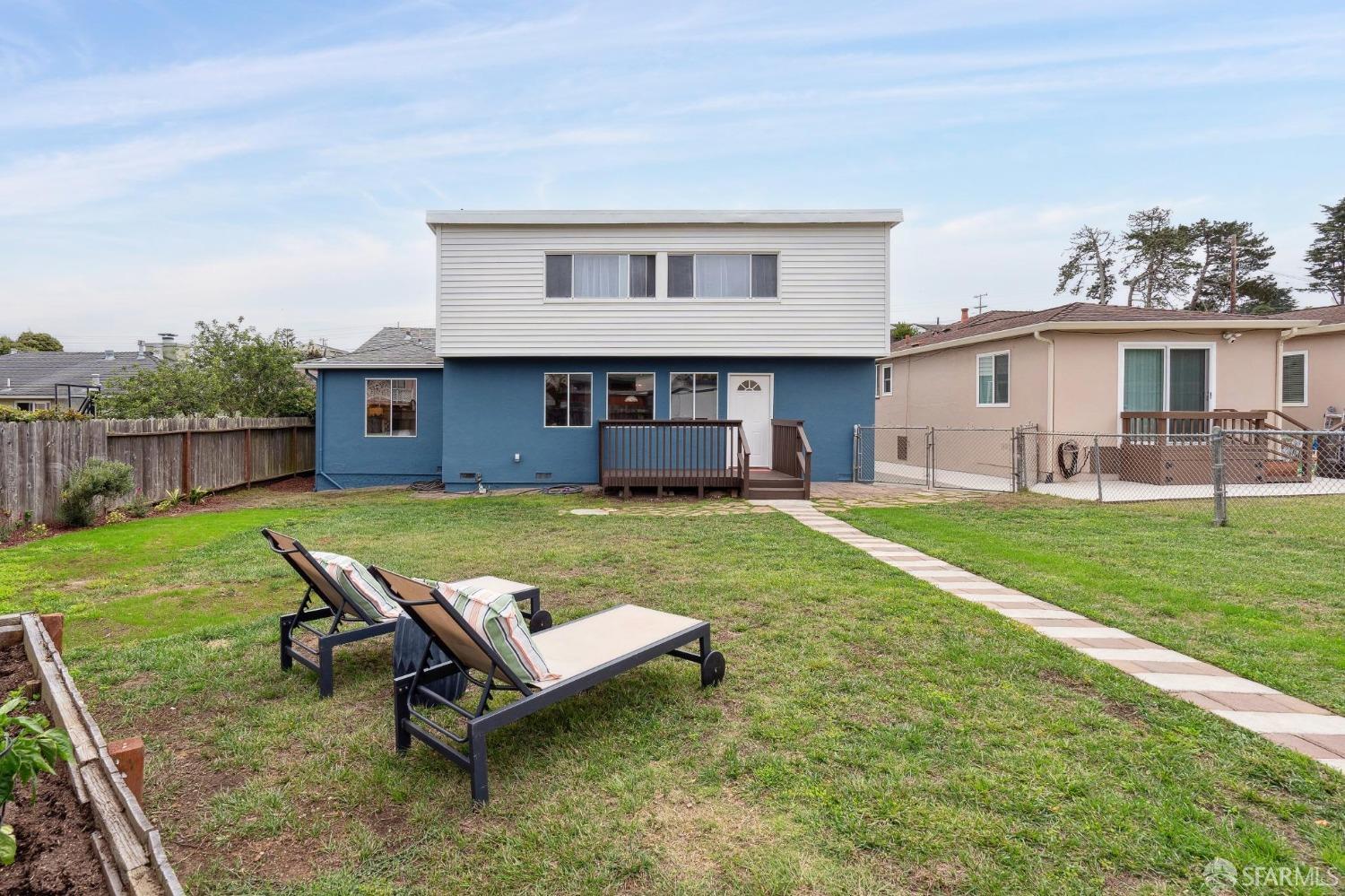 512 Macarthur Drive Daly City, CA 94015 - Photo 46 of 53 a backyard of a house with table and chairs
