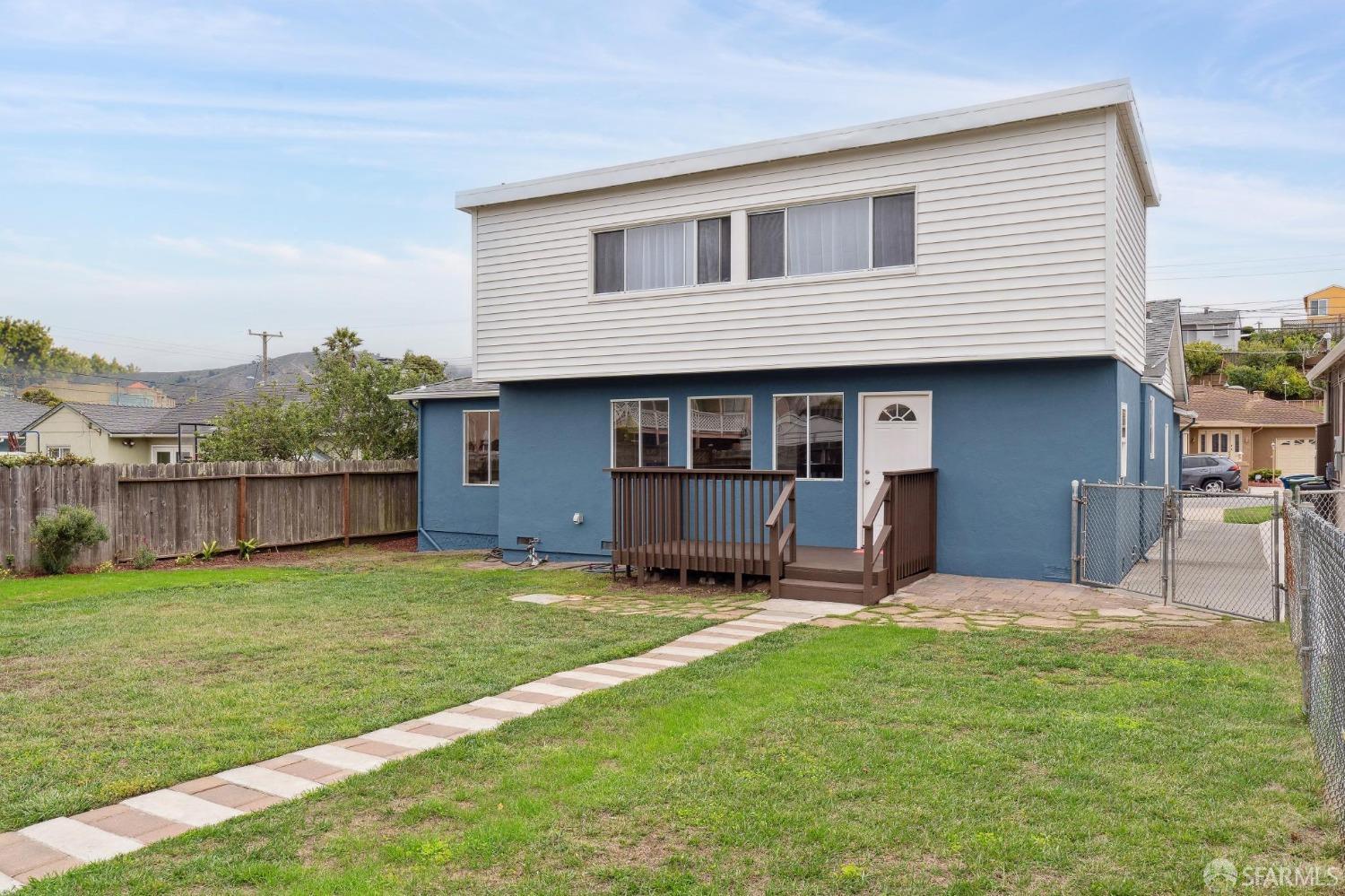 512 Macarthur Drive Daly City, CA 94015 - Photo 47 of 53 a view of a house with a yard and sitting area