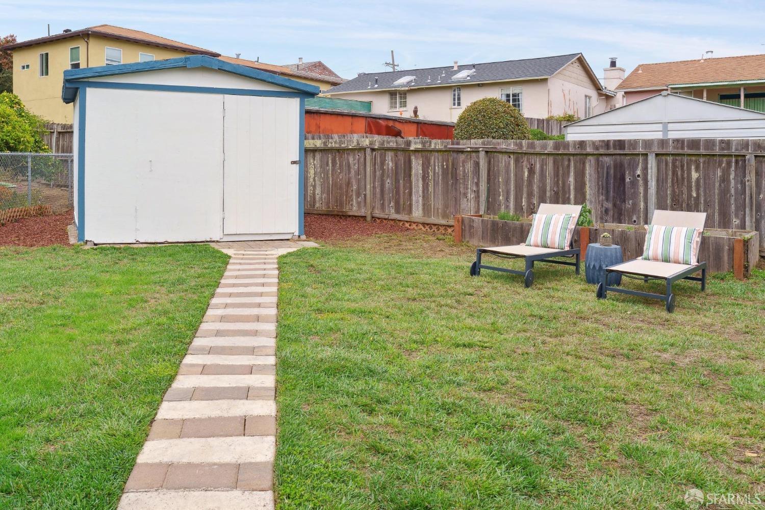 512 Macarthur Drive Daly City, CA 94015 - Photo 48 of 53 a front view of a house with garden