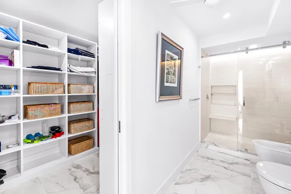 a bathroom with a bathtub and a shower