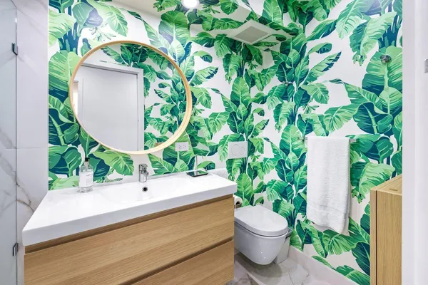 a bathroom with a toilet and a sink