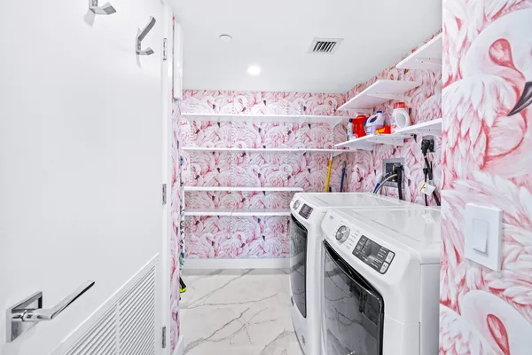 a utility room with a washer and dryer