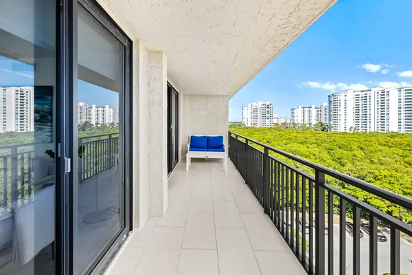 a view of a balcony with an outdoor space