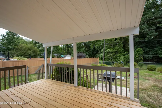 a balcony with wooden floor