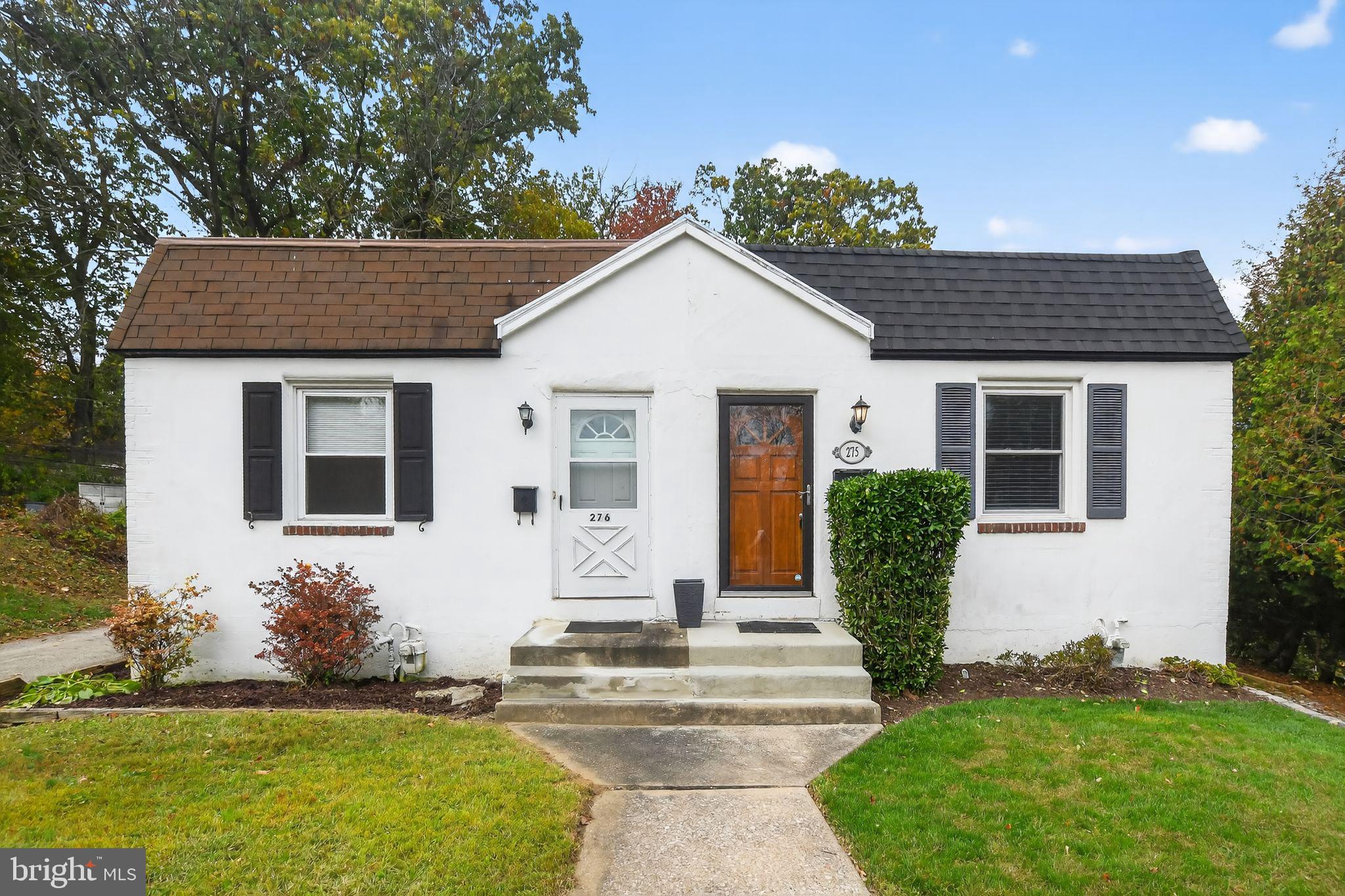 276 Valley View Road Malvern, PA 19355 - Photo 14 of 15 a front view of house with yard and green space