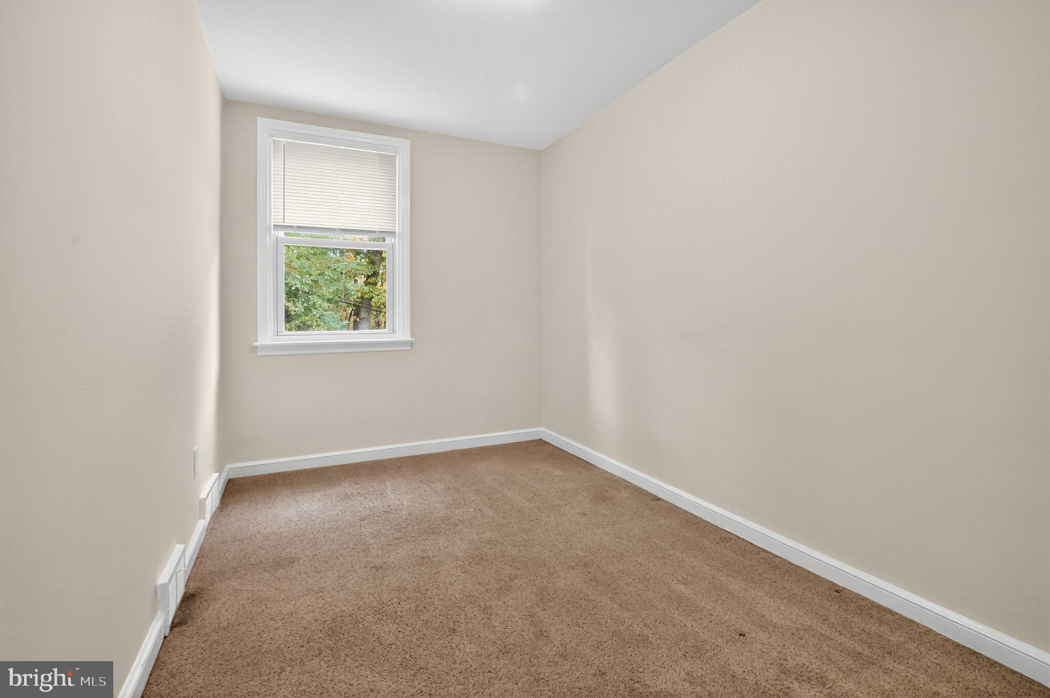 276 Valley View Road Malvern, PA 19355 - Photo 9 of 15 an empty room with windows