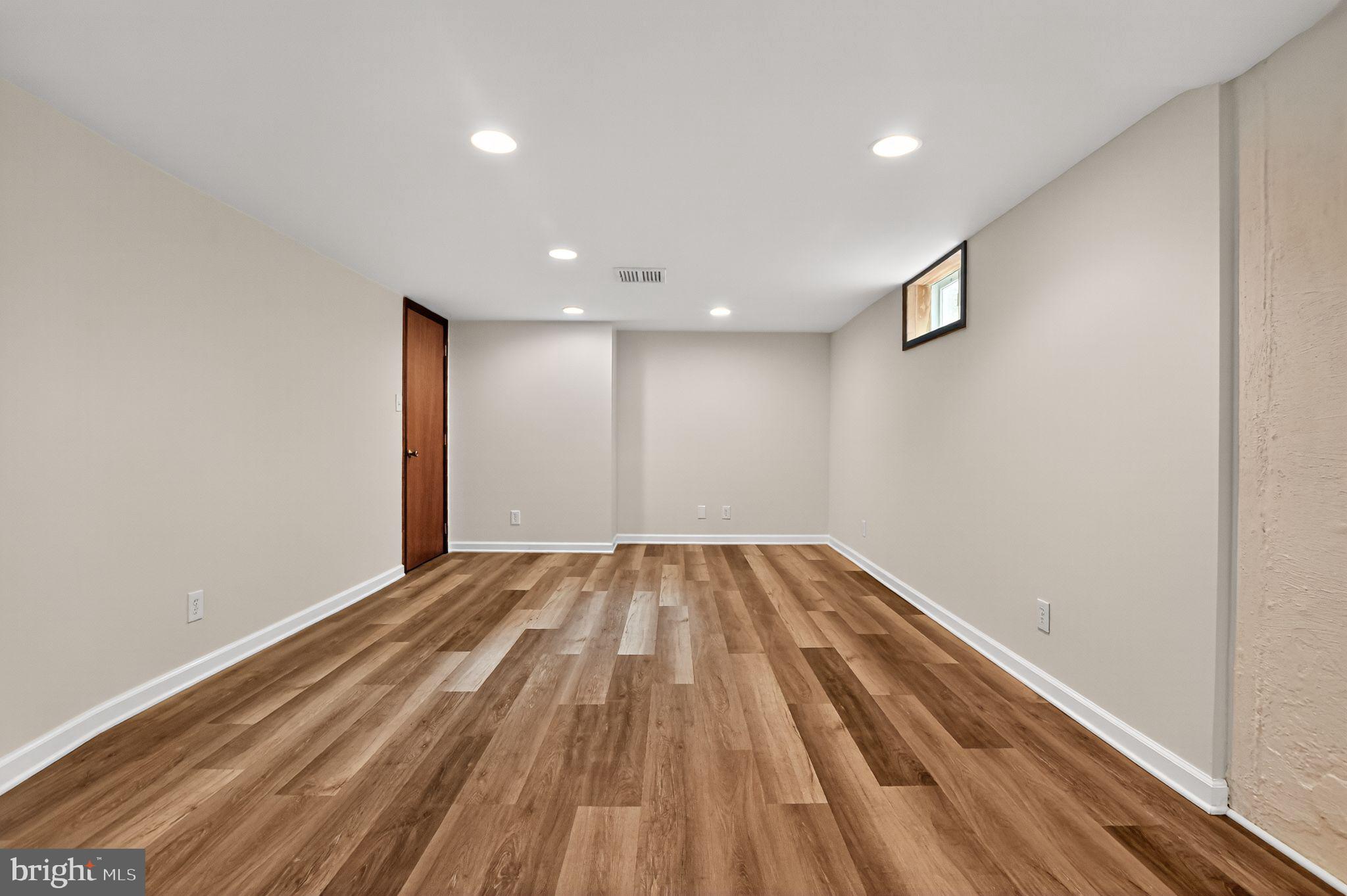 276 Valley View Road Malvern, PA 19355 - Photo 10 of 15 a view of empty room with wooden floor