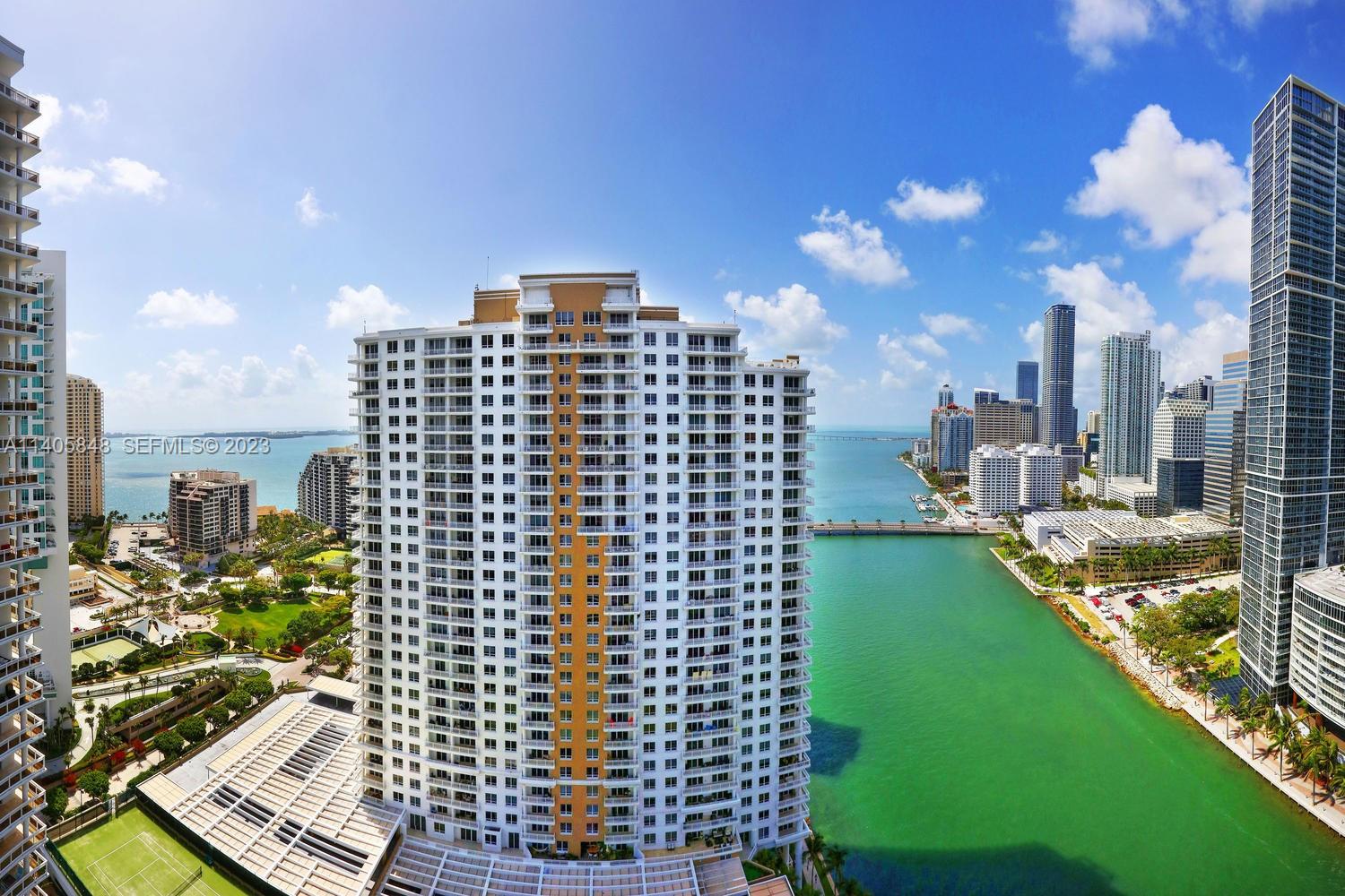 901 Brickell Key Boulevard, Unit 2903 Miami, FL 33131 - Photo 30 of 31 a view of a city with tall buildings