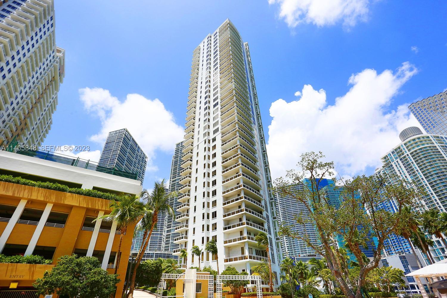 901 Brickell Key Boulevard, Unit 2903 Miami, FL 33131 - Photo 31 of 31 a view of a city with tall buildings