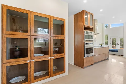 a kitchen with stainless steel appliances refrigerator and cabinets