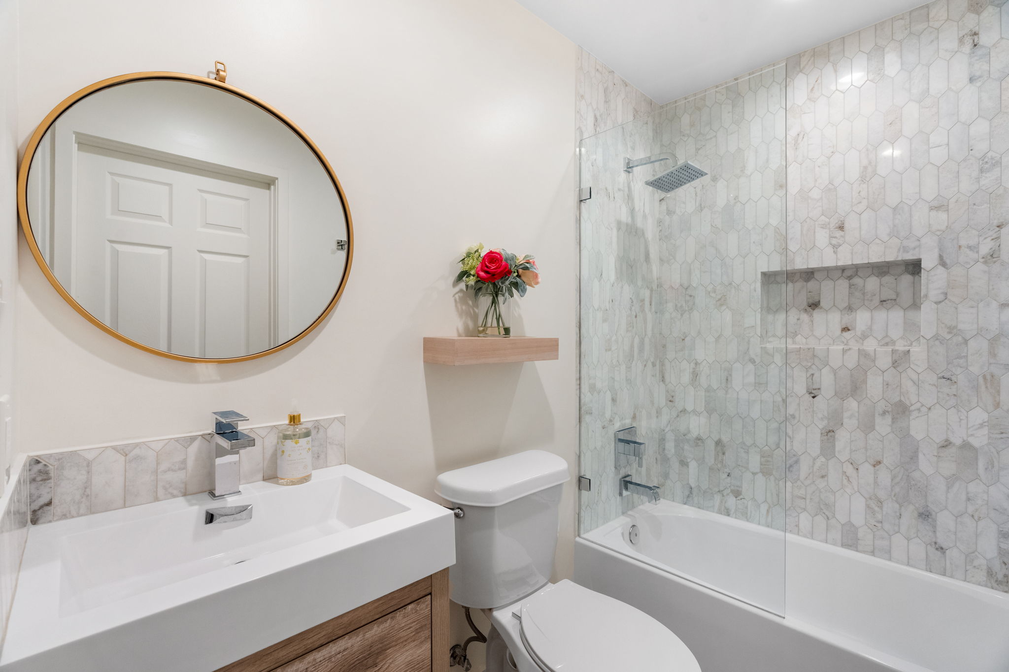 1 Sparrowglen Lane Austin, TX 78738 - Photo 23 of 36 a bathroom with a sink toilet and a mirror