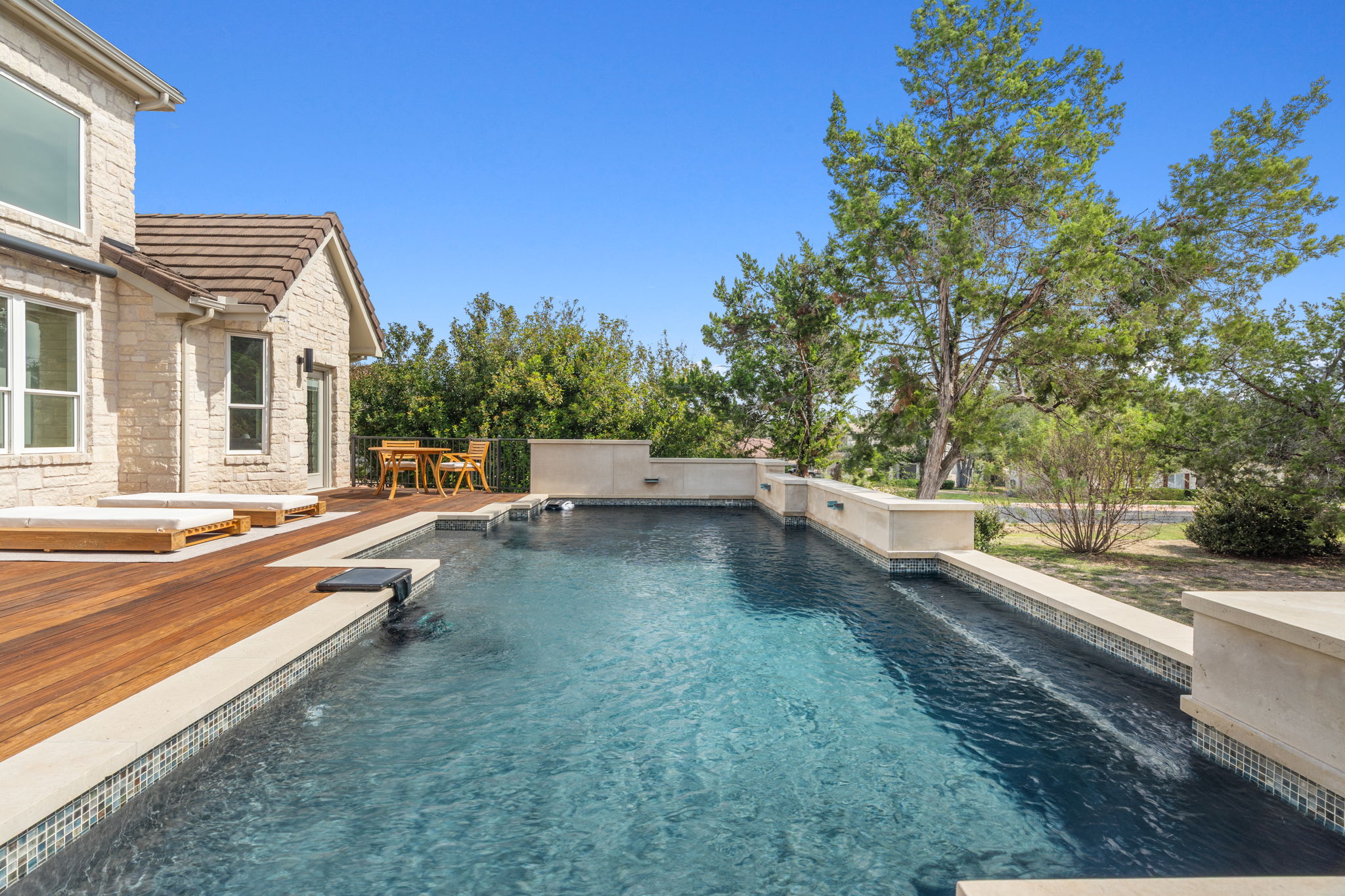 1 Sparrowglen Lane Austin, TX 78738 - Photo 28 of 36 a view of a house with swimming pool
