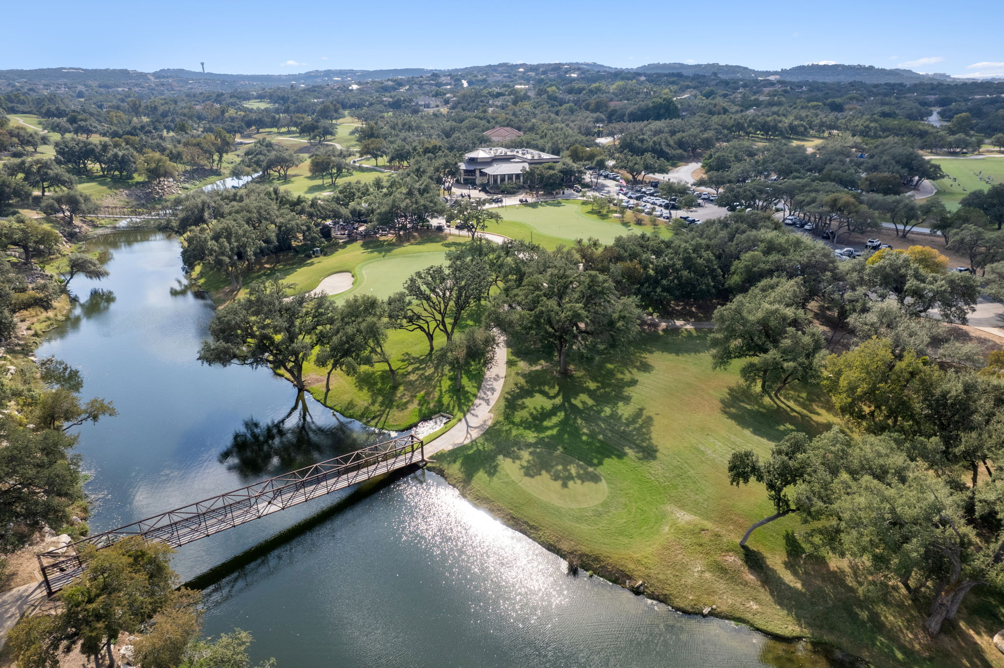 1 Sparrowglen Lane Austin, TX 78738 - Photo 33 of 36 a view of a lake in middle of the town