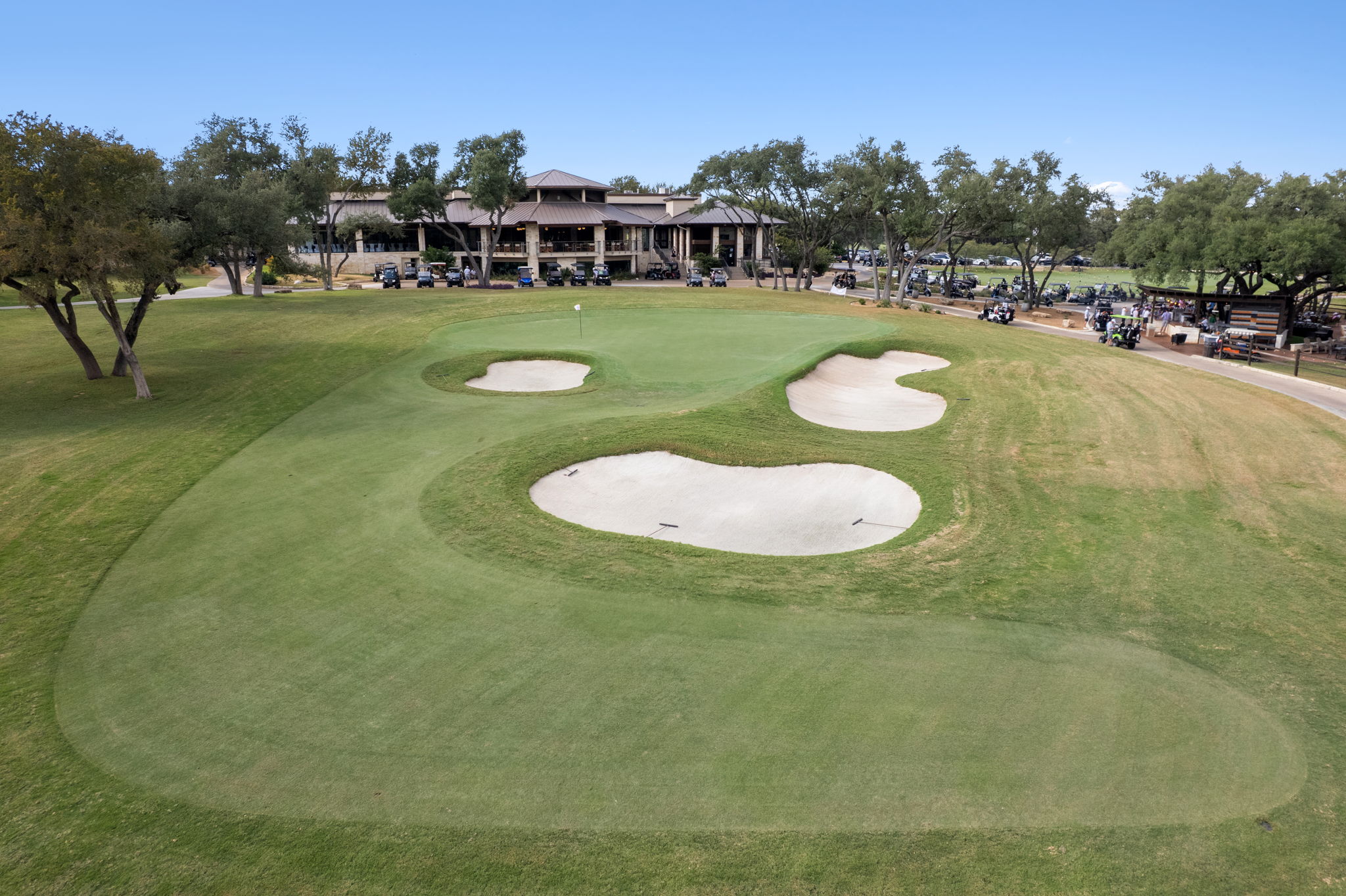 1 Sparrowglen Lane Austin, TX 78738 - Photo 34 of 36 a view of a swimming pool and trees in the background