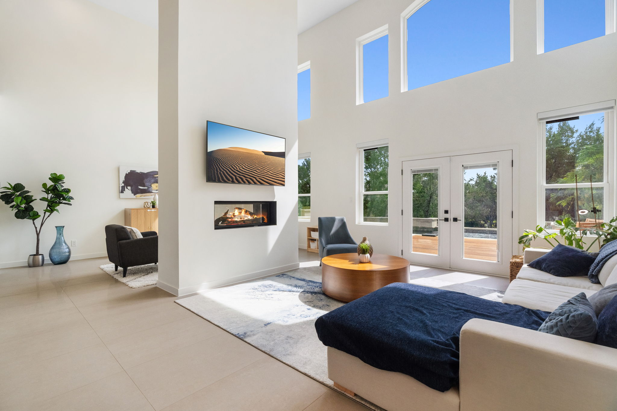 1 Sparrowglen Lane Austin, TX 78738 - Photo 7 of 36 a living room with furniture and a potted plant