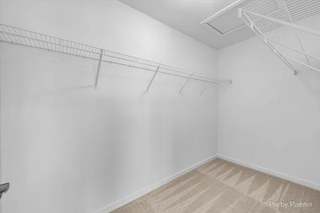 a view of a room with racks on the wall