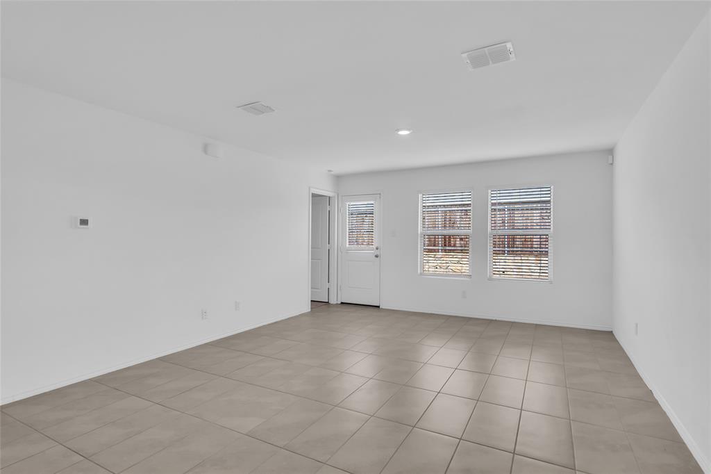 14069 Drover Street Pilot Point, TX 76258 - Photo 12 of 27 a view of an empty room with a window
