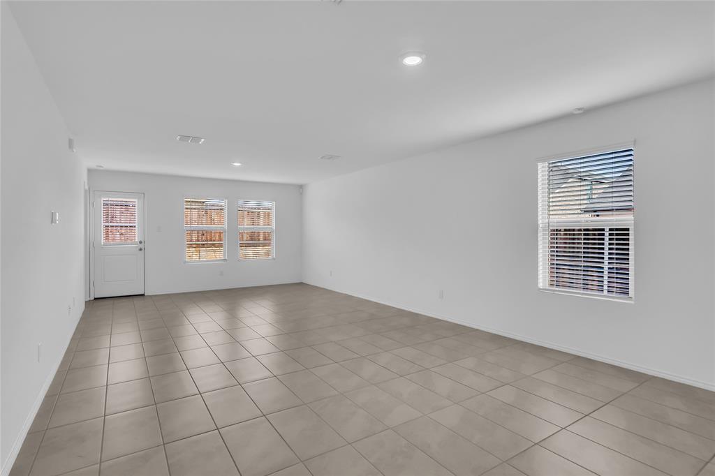 14069 Drover Street Pilot Point, TX 76258 - Photo 10 of 27 an empty room with windows