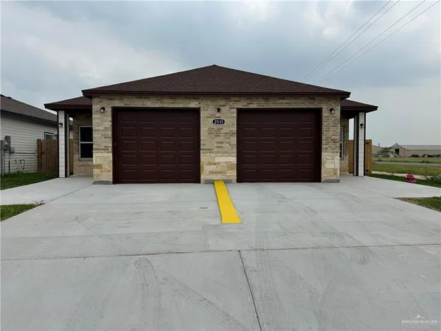 a view of a house with garage