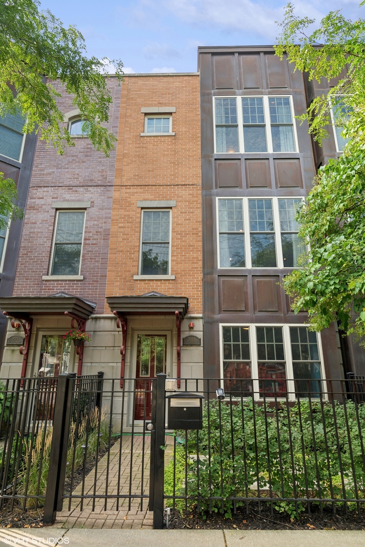 3003 West Cornelia Avenue Chicago, IL 60618 - Photo 1 of 25 front view of a brick building