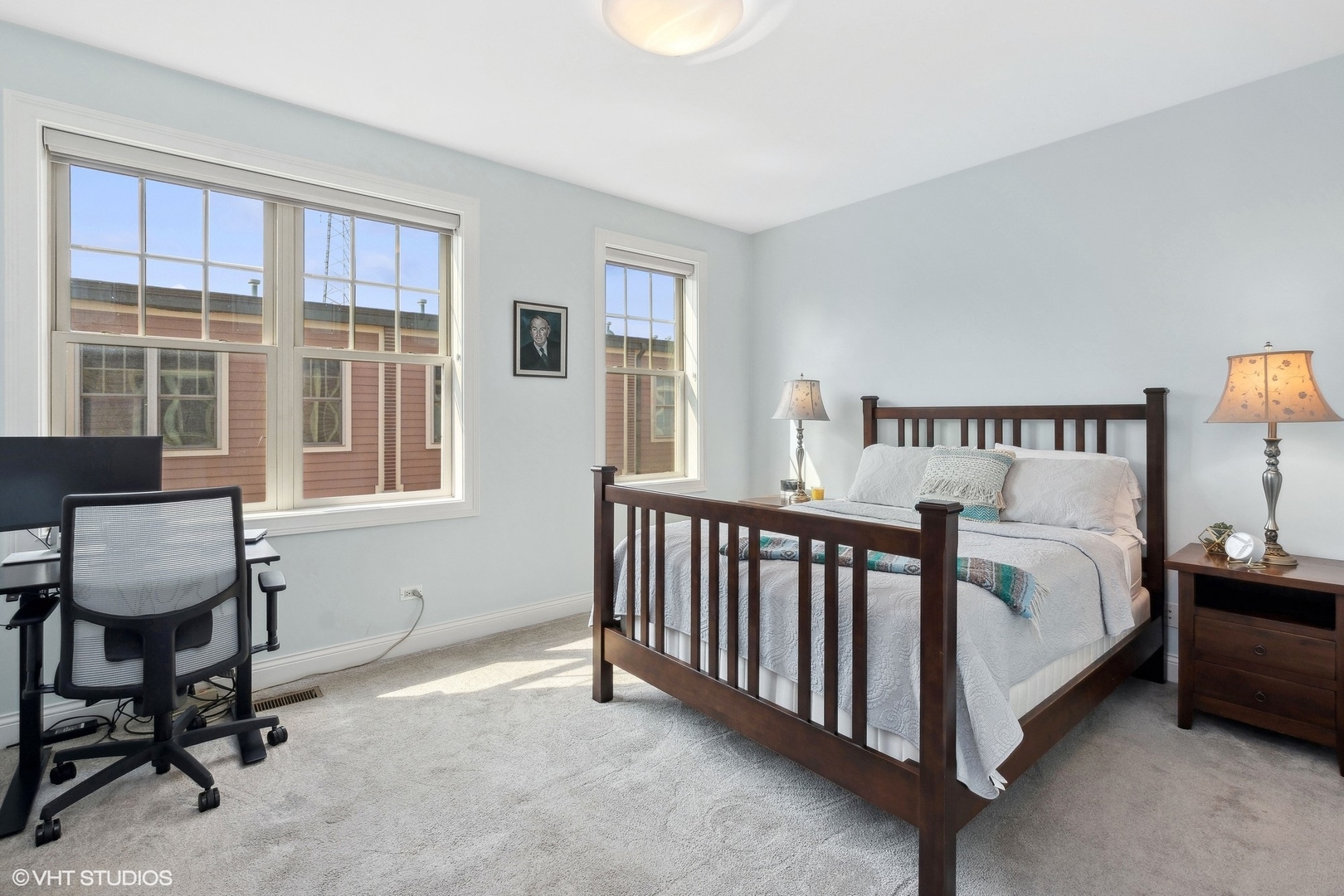 3003 West Cornelia Avenue Chicago, IL 60618 - Photo 11 of 25 a bed room with a bed and a chair