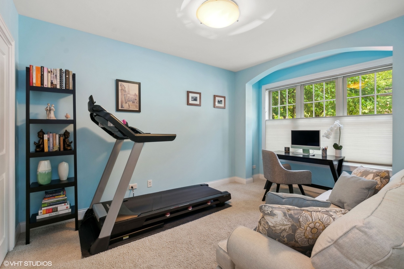 3003 West Cornelia Avenue Chicago, IL 60618 - Photo 14 of 25 a living room with furniture gym equipment and a window