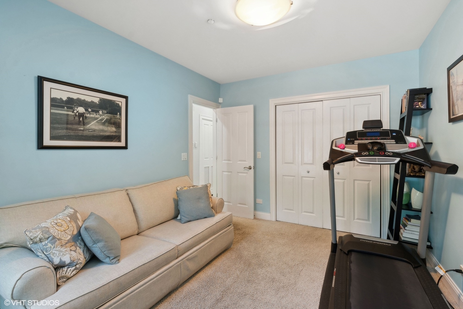 3003 West Cornelia Avenue Chicago, IL 60618 - Photo 15 of 25 a living room with furniture and a flat screen tv
