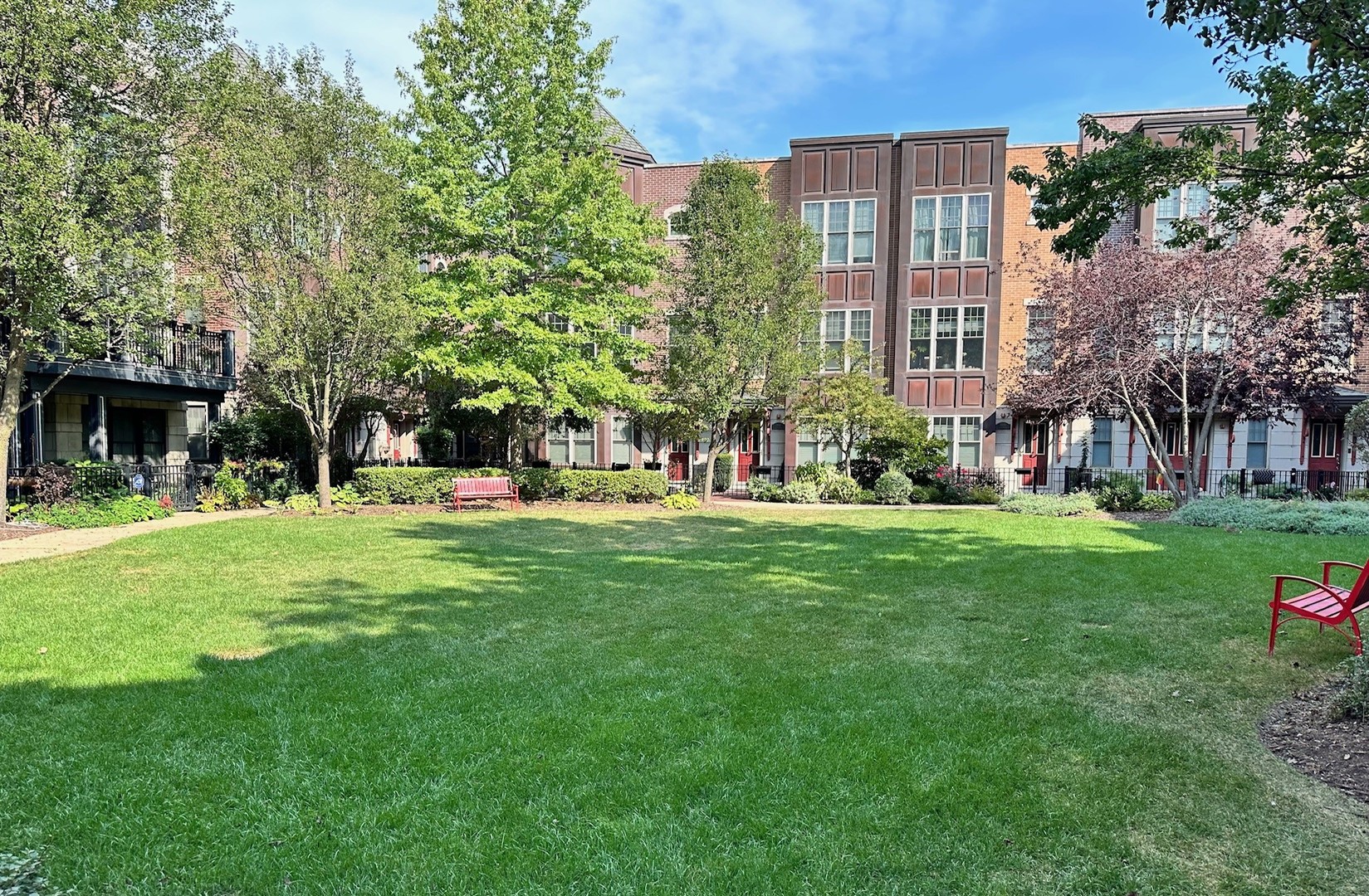 3003 West Cornelia Avenue Chicago, IL 60618 - Photo 20 of 25 a view of a building with a yard