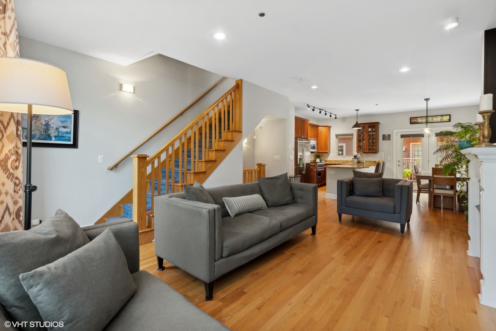 3003 West Cornelia Avenue Chicago, IL 60618 - Photo 3 of 25 a living room with furniture and a wooden floor