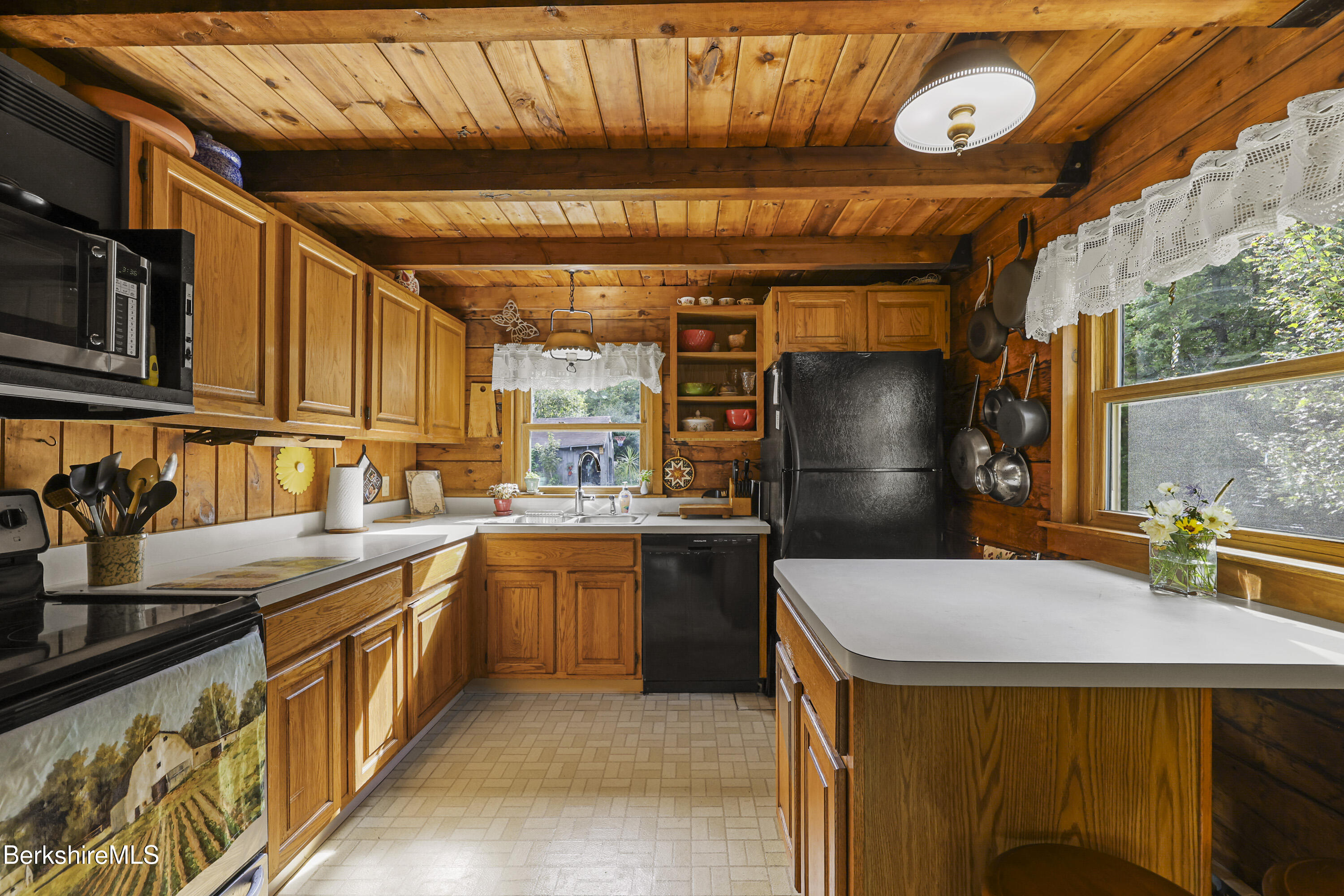 78 East Main Road Peru, MA 01235 - Photo 22 of 56 a kitchen with stainless steel appliances granite countertop a sink a stove and a refrigerator