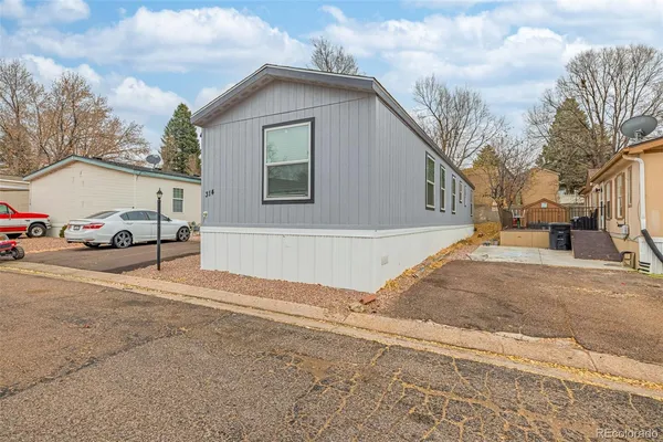 a view of a house with a street