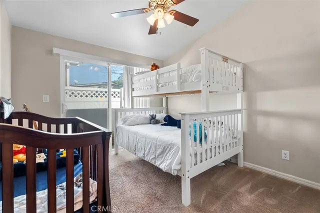 a bedroom with furniture and a window