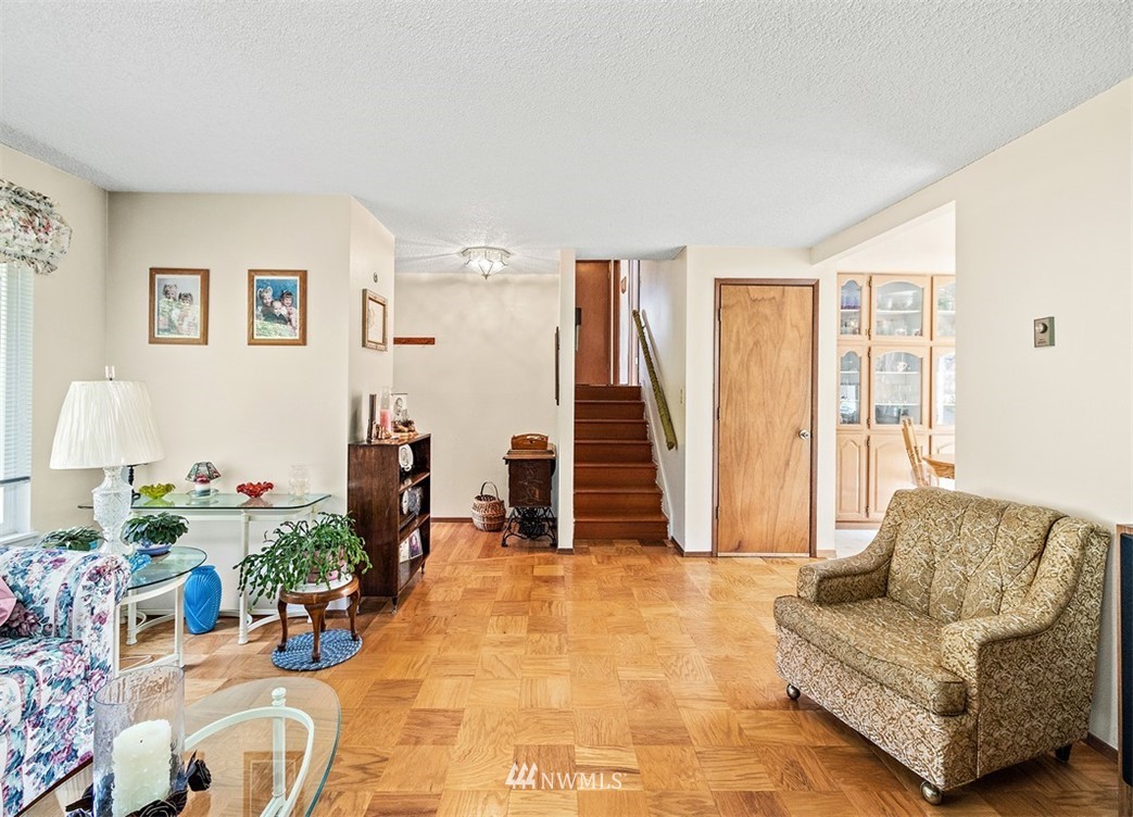 120 161st Street Southeast Bothell, WA 98012 - Photo 8 of 26 a living room with furniture and a large window